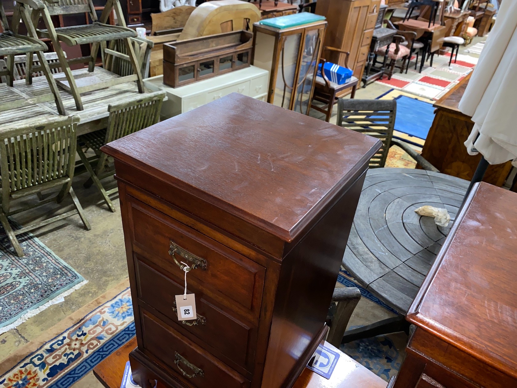 A pair of Victorian and later mahogany three drawer bedside chests (altered), width 39cm, depth 39cm, height 73cm